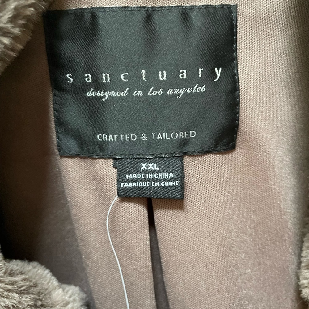 Soft faux, jacket only used twice. Very mint condition. It’s extra large